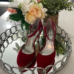 Women’s strappy red high heels